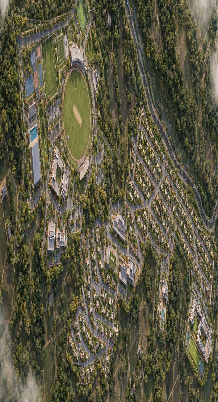 Aerial view of the integrated Club Deeper campus with sport, school and bungalow clusters